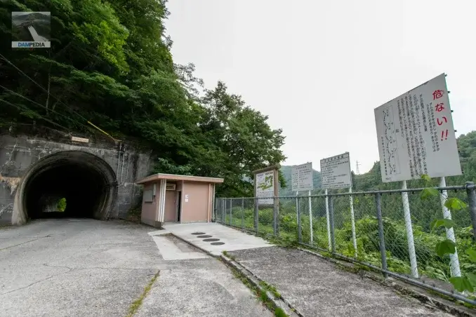 Tunnel, restroom, discharge warning sign and water use sign